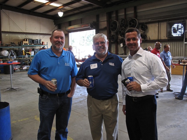 Standard’s President, Greg Ryder, and guests pause for a photo op.